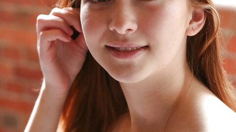 Beautiful teen with big ass Lulu Reynolds unveils her tiny tits and red thongs