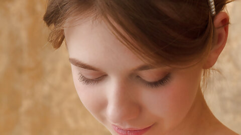 Young beauty Siya uncovers her full breasts before showing her trimmed pussy