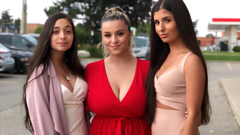 Outboobing her friends.