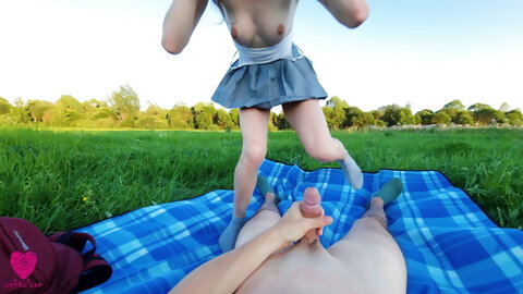 A romantic evening walk in nature ended with sex in clothes in a beautiful meadow next to the road